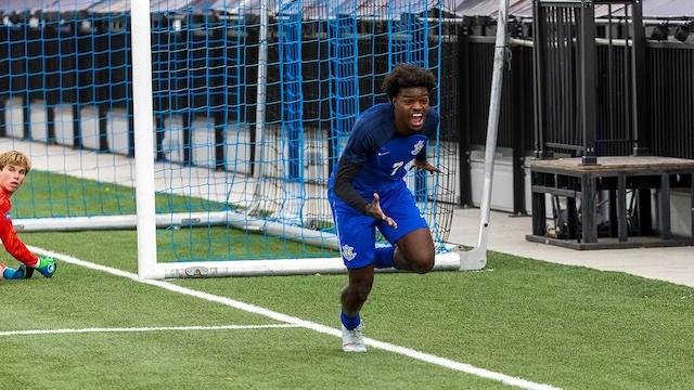 Rollins celebrates advancing to the DII men's soccer championship.
